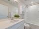 Bright bathroom with white cabinets, a mirror, a combined shower and tub, and white walls at 207 Winding River Dr, Johns Island, SC 29455