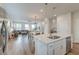 Open concept kitchen with island and stainless steel appliances at 207 Winding River Dr, Johns Island, SC 29455