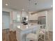 Modern kitchen with white cabinetry, stainless steel appliances, a center island, and stylish pendant lighting at 207 Winding River Dr, Johns Island, SC 29455