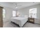 Bright bedroom with a ceiling fan, carpet, and multiple windows for lots of natural light at 207 Winding River Dr, Johns Island, SC 29455