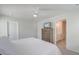 Bright bedroom featuring an open ensuite bathroom and a modern ceiling fan at 207 Winding River Dr, Johns Island, SC 29455