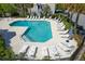 Inviting pool with plenty of lounge chairs for relaxing and enjoying the sun in a gated community at 207 Winding River Dr, Johns Island, SC 29455