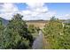 Scenic view overlooking a marsh, trees, and waterway, providing a serene and picturesque backdrop at 207 Winding River Dr, Johns Island, SC 29455