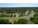 Aerial view of a golf course offering lush greenery and serene water features, creating a picturesque and tranquil landscape at 2131 Pentland Dr, Charleston, SC 29412