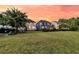 Spacious backyard featuring a green lawn, perfect for Gathering activities and outdoor gatherings at 2131 Pentland Dr, Charleston, SC 29412