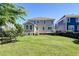 Backyard featuring a lush lawn, mature trees, and plenty of space for outdoor activities at 2131 Pentland Dr, Charleston, SC 29412