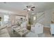 Open-concept living area featuring a kitchen, dining area, and staircase at 2131 Pentland Dr, Charleston, SC 29412