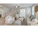 Cozy living room with neutral tones, comfortable seating, and an abundance of natural light at 2131 Pentland Dr, Charleston, SC 29412
