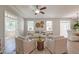 Open-concept living area with neutral furniture, hardwood flooring, and connecting rooms at 2131 Pentland Dr, Charleston, SC 29412