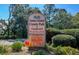 Entrance sign to James Island County Park & Campground, providing directions and operating hours, welcoming visitors to outdoor recreation at 2131 Pentland Dr, Charleston, SC 29412