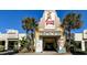 Charming view of the Terrace Theater exterior with vintage marquee, palm trees, and adjacent Bar George, offering an entertainment experience at 2131 Pentland Dr, Charleston, SC 29412