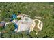 Aerial view of a community waterpark featuring waterslides, splash area and winding lazy river at 2131 Pentland Dr, Charleston, SC 29412