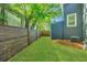 This fenced backyard offers a clean lawn and a charming shed, perfect for outdoor activities and storage at 2130 Weaver St, Charleston, SC 29403