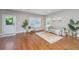 Bright living room with hardwood floors, stylish furniture, neutral colors and natural light at 2130 Weaver St, Charleston, SC 29403