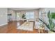 Bright and spacious living room featuring hardwood floors, natural light, and comfortable seating at 2130 Weaver St, Charleston, SC 29403
