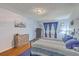 This bedroom features hardwood floors, nice paint and natural light at 2150 Spoleto Ln # B-11, North Charleston, SC 29406