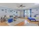 Comfortable living room features hardwood floors, neutral paint and lots of natural light at 2150 Spoleto Ln # B-11, North Charleston, SC 29406