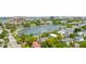 Aerial view of a city park with a large lake and multiple building complexes nearby at 23 Savage St, Charleston, SC 29401