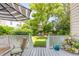 A lovely backyard features a well-manicured lawn and lush greenery, perfect for outdoor relaxation and entertainment at 23 Savage St, Charleston, SC 29401