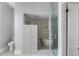 Modern bathroom featuring a glass-enclosed shower with built-in bench and sleek fixtures at 23 Savage St, Charleston, SC 29401