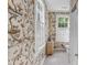 Bright bathroom with beautiful wallpaper, showcasing a patterned design and natural light at 23 Savage St, Charleston, SC 29401