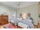 Comfortable bedroom showcasing twin beds with patterned bedding and a decorative area rug at 23 Savage St, Charleston, SC 29401