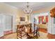 Bright and airy dining room with a chandelier and seamless flow to living areas at 23 Savage St, Charleston, SC 29401