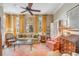 Spacious living room with large windows, comfortable seating, and beautiful decor at 23 Savage St, Charleston, SC 29401