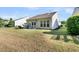 Spacious backyard with patio and seating area, ideal for outdoor entertaining and relaxation at 239 Sea Lavender Ln, Summerville, SC 29486