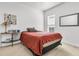 Cozy bedroom featuring a comfortable bed, side table, and natural light at 239 Sea Lavender Ln, Summerville, SC 29486