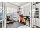 Bright office with hardwood floors, a window with blinds, and built-in shelving at 239 Sea Lavender Ln, Summerville, SC 29486