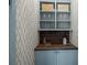 Butler's pantry features custom shelving, a countertop, and cabinets for storage and preparation at 24 Chalmers St, Charleston, SC 29401