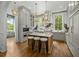 Spacious kitchen features a large island with seating, marble countertops, and stainless steel appliances at 24 Chalmers St, Charleston, SC 29401