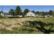 Exterior of a home with a mostly cleared lot and various construction equipment nearby at 250 Dandelion Ct, Round O, SC 29474