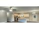 Spacious living room with an open concept kitchen, stainless appliances and granite countertops at 250 Dandelion Ct, Round O, SC 29474