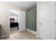 Bathroom with tiled floors leads to the bedroom on the left and shower stall on the right at 2505 Stadium Dr, North Charleston, SC 29406