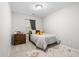 Cozy bedroom with a comfortable bed, carpet flooring, and a charming decor at 2505 Stadium Dr, North Charleston, SC 29406