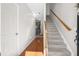 Inviting entryway featuring wood floors, staircase, and an open layout at 2505 Stadium Dr, North Charleston, SC 29406