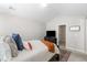 Serene main bedroom with a plush bed, decorative pillows, and a minimalist, calming aesthetic at 2505 Stadium Dr, North Charleston, SC 29406