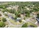 Aerial view of a property showcasing the home's layout, pool, and surrounding neighborhood at 2506 Birkenhead Dr, Charleston, SC 29414