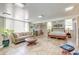 Spacious basement area featuring a sofa, bed, tile flooring, and ample lighting at 2506 Birkenhead Dr, Charleston, SC 29414