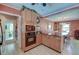 Charming kitchen with granite countertops, stainless steel appliances, and a seamless flow to the dining area at 2506 Birkenhead Dr, Charleston, SC 29414