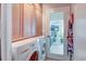 Functional laundry area equipped with modern appliances and built-in storage cabinets for added convenience at 2506 Birkenhead Dr, Charleston, SC 29414