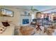 Spacious living area with a fireplace, opening up to the modern kitchen at 2506 Birkenhead Dr, Charleston, SC 29414