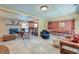 Spacious living room with fireplace open to kitchen and dining areas, ideal for gatherings and daily living at 2506 Birkenhead Dr, Charleston, SC 29414