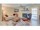 Comfortable living room with fireplace and ceiling fan, perfect for relaxation at 2506 Birkenhead Dr, Charleston, SC 29414