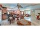 Open-concept living room with bar seating, connecting kitchen, dining, and living areas for seamless flow at 2506 Birkenhead Dr, Charleston, SC 29414