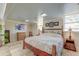 Comfortable main bedroom featuring a cozy bed, dresser, and natural light from the windows at 2506 Birkenhead Dr, Charleston, SC 29414