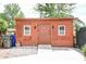 Charming backyard shed complete with a ramp and decorated lattice work for extra style at 2506 Birkenhead Dr, Charleston, SC 29414