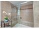 Walk-in shower with glass doors and decorative tile, providing a spa-like experience at 2506 Birkenhead Dr, Charleston, SC 29414